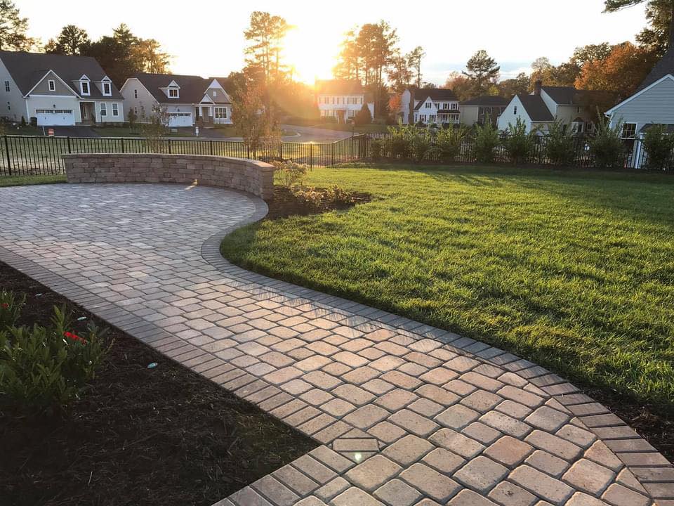 Paver walkway and patio at sunset