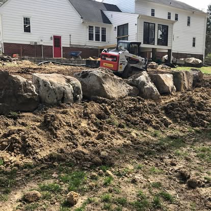 Excavation and boulder placement